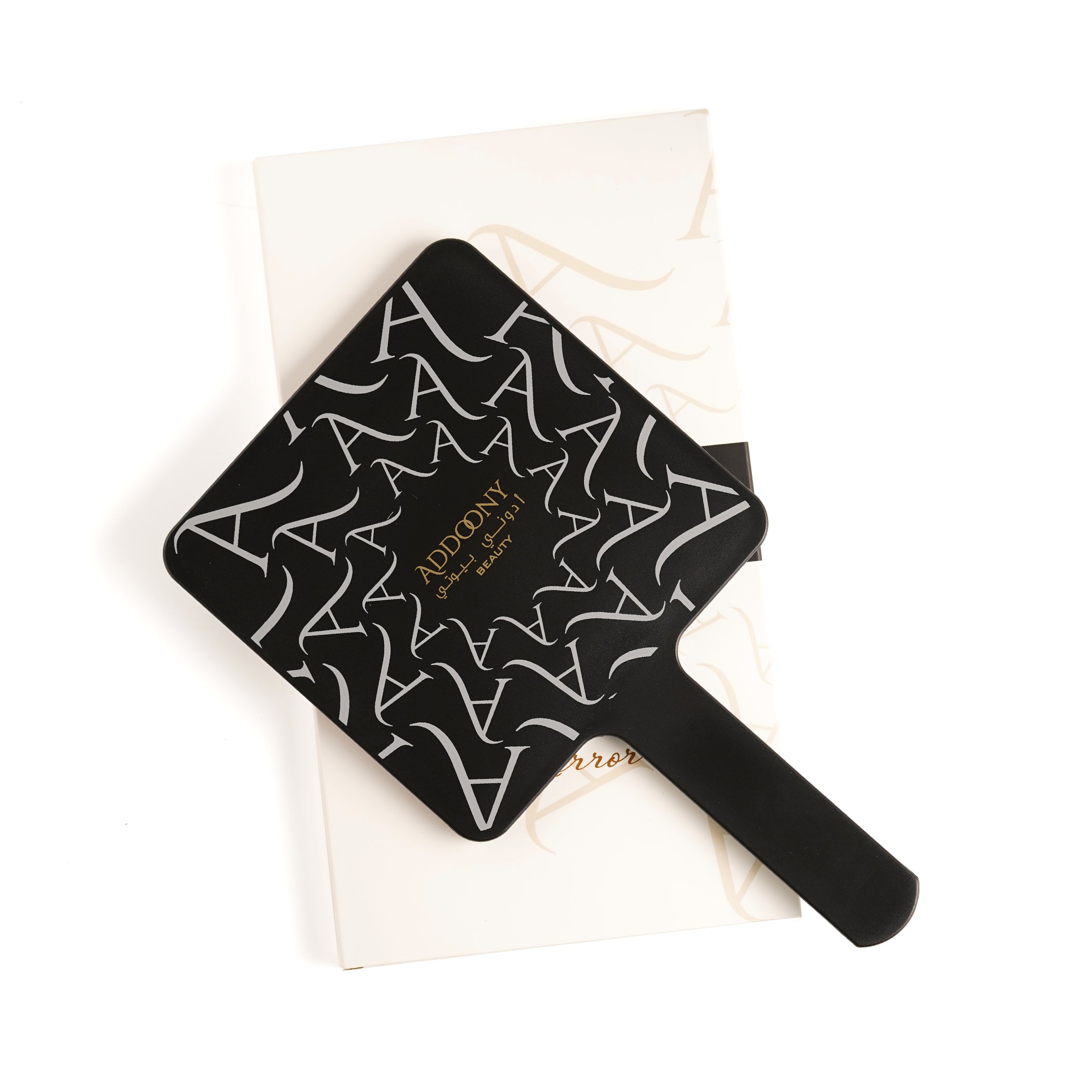 Addoony Beauty Gifts handheld mirror with handle, compact tool for personal grooming, featuring a sleek design and reflective surface.
