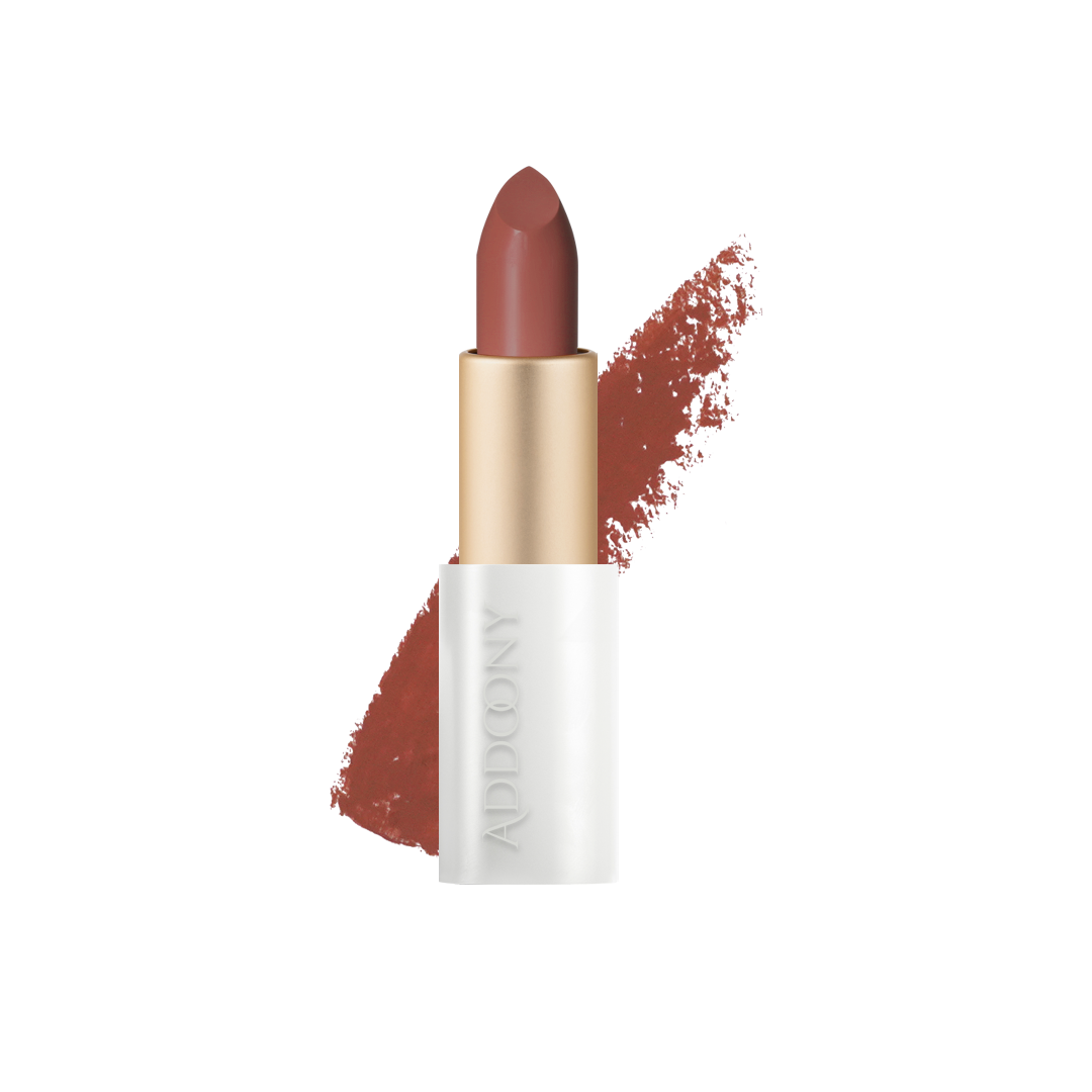 Addoony Beauty Deem lipstick with swatch showing rich, matte color in a sleek tube, highlighting the product's vibrant shade.