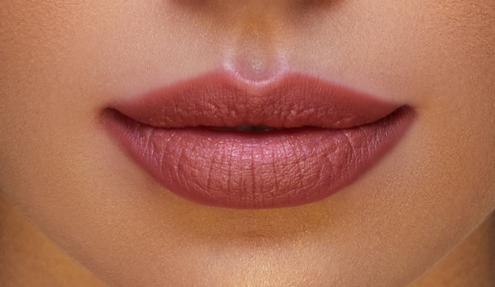 Addoony Beauty Fitna lipstick in medium shade, showcasing the vibrant, smooth lipstick bullet with a sleek packaging design.