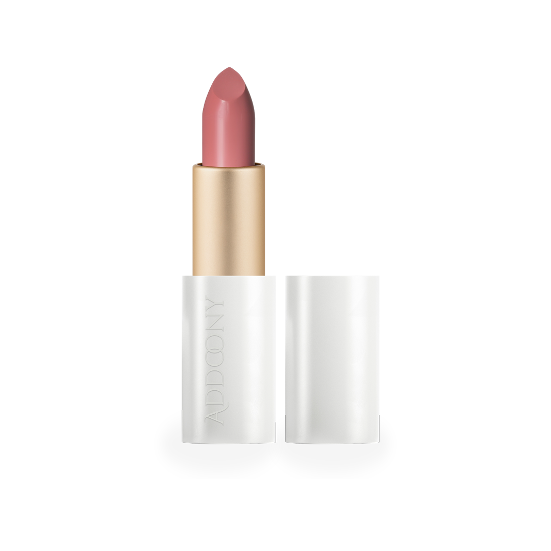 Addoony Beauty Indian Rose lipstick in a sleek tube, featuring a vibrant pink shade and floral design on the packaging.