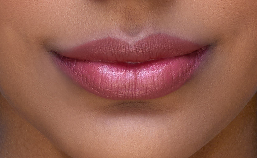 Addoony Beauty Proven Lipstick in Qataf shade, showcasing a tan-colored lipstick with sleek packaging.