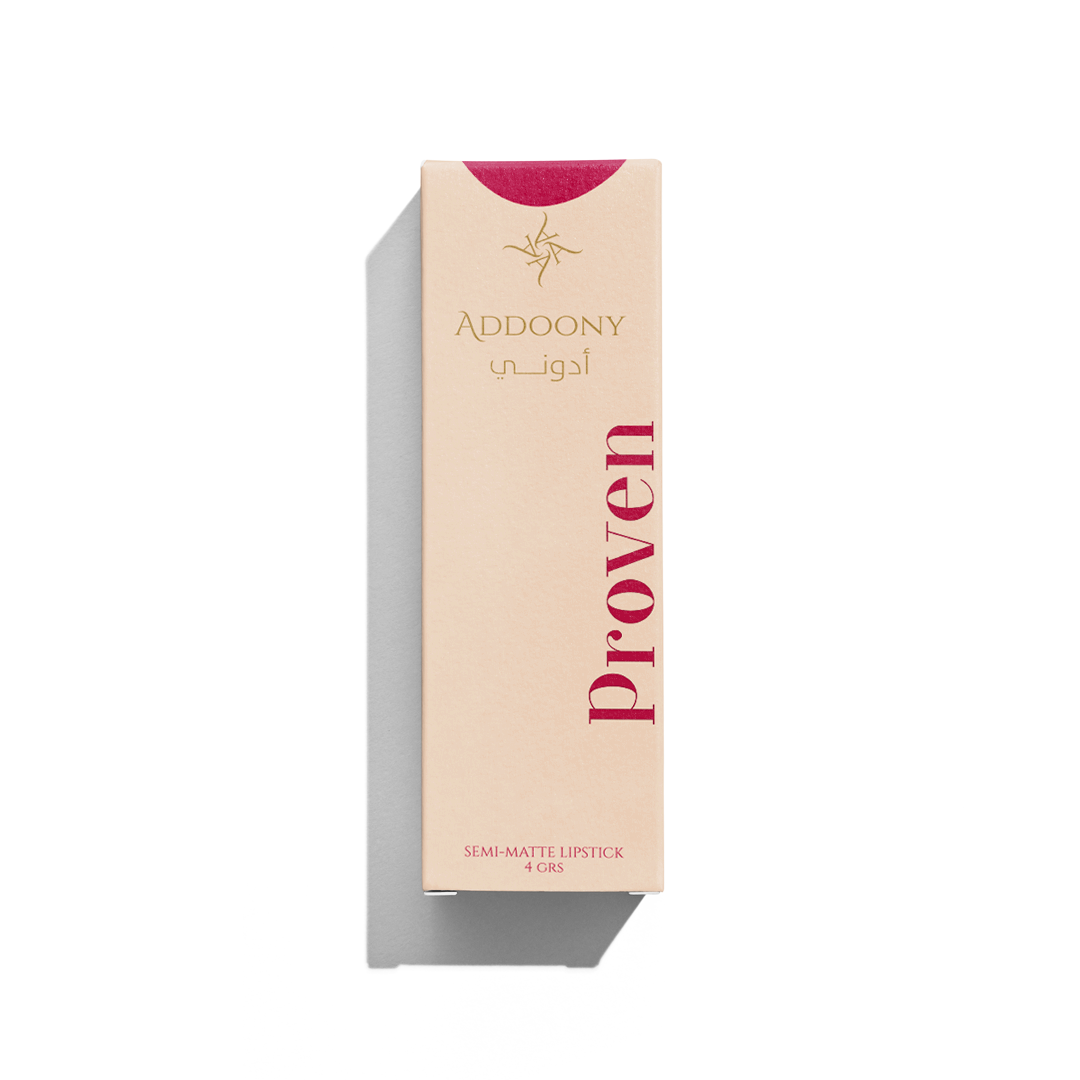 Addoony Beauty Tea Rose lipstick in a sleek tube, featuring a soft pink shade with a smooth, creamy texture.