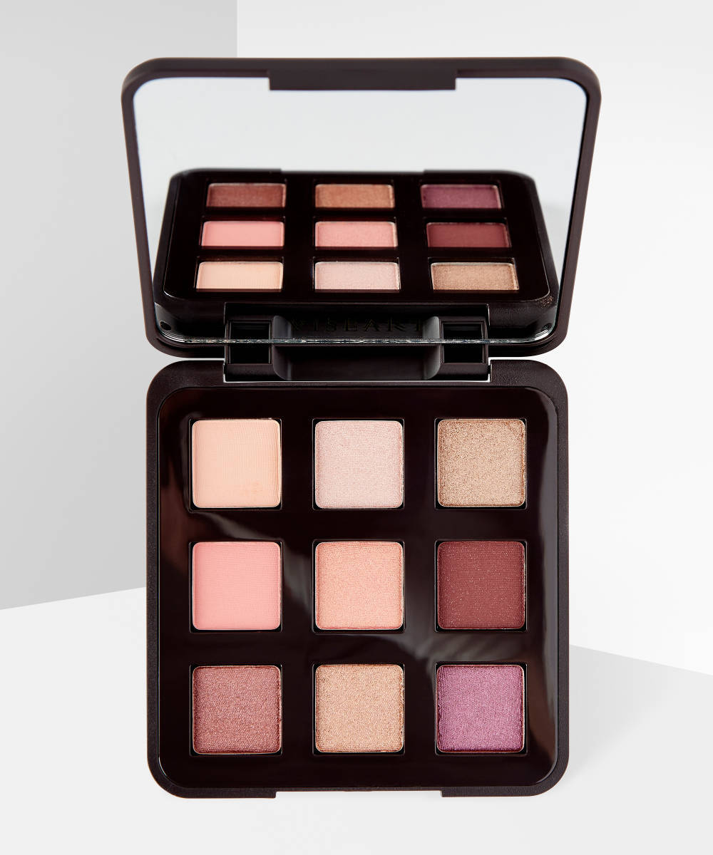 VISEART Tryst eyeshadow palette featuring a variety of neutral and bold shades in sleek packaging for versatile eye makeup.