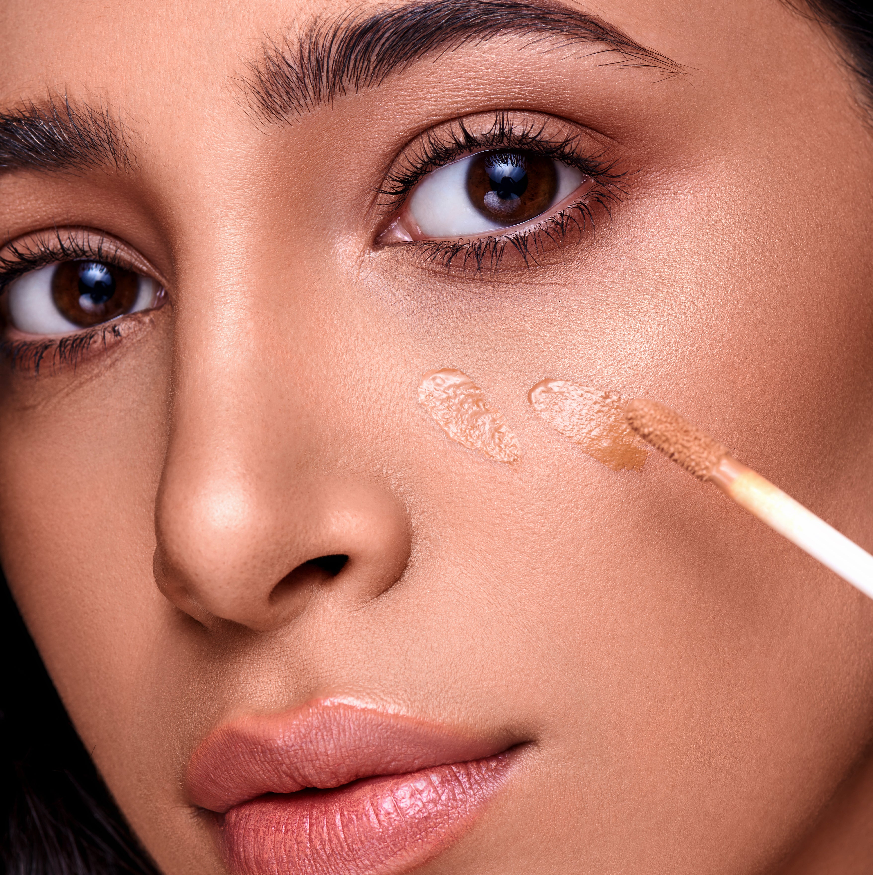 Addoony Correct Me Corrector in Saffron color, a cosmetic product designed to conceal imperfections and brighten skin.