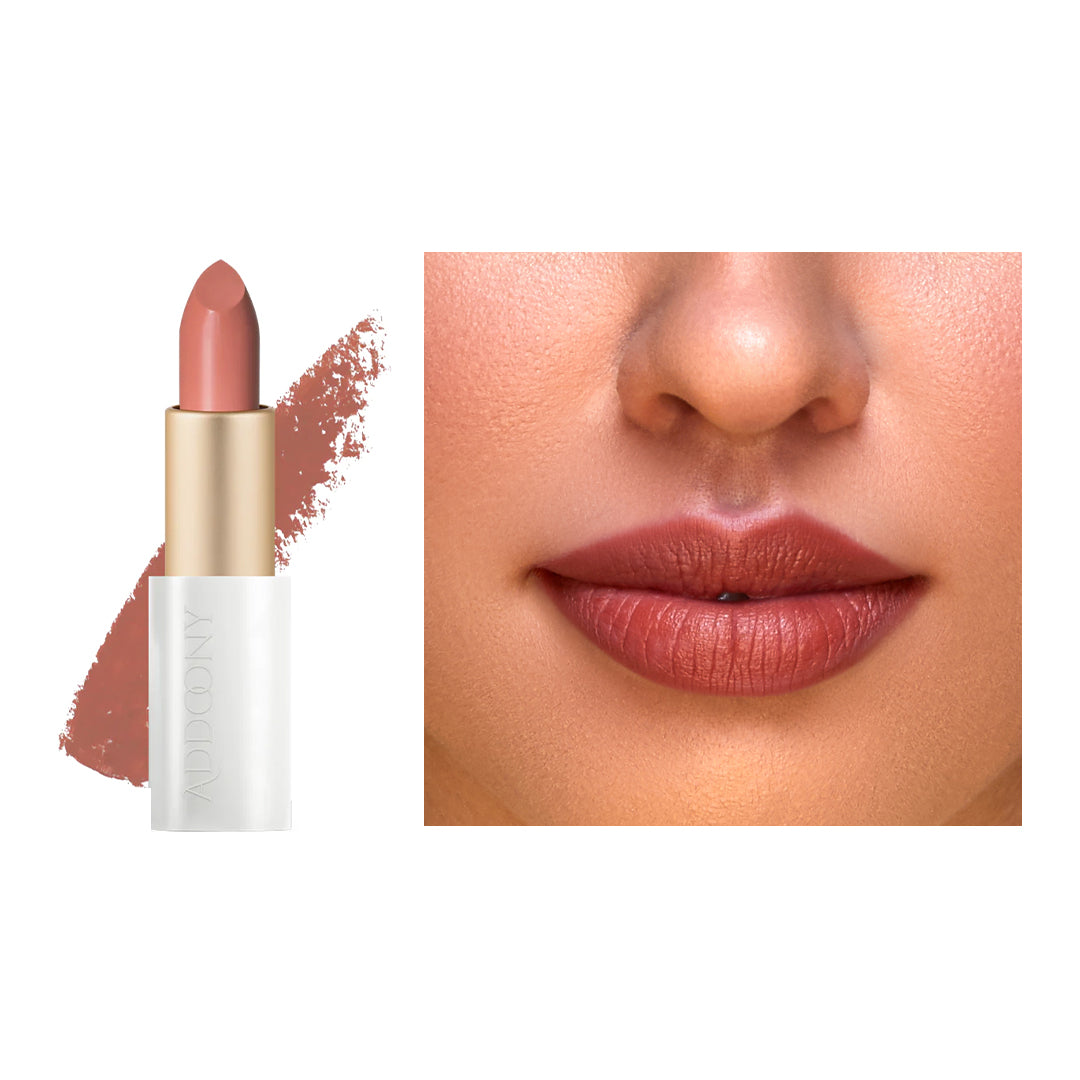 Addoony Beauty Proven Lipstick in Fitna shade, vibrant red lipstick tube with the product label visible.