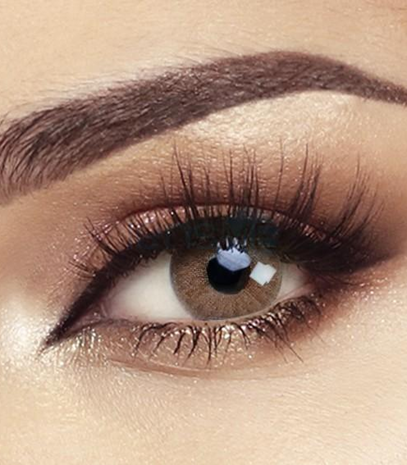 Close-up of a person's eye with makeup, including eyeliner and mascara.