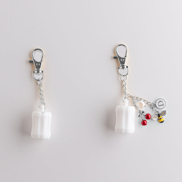 Addoony Lip Oil Bag Charm (Silver & White) - تعليقه مرطب الشفاه للشنطه