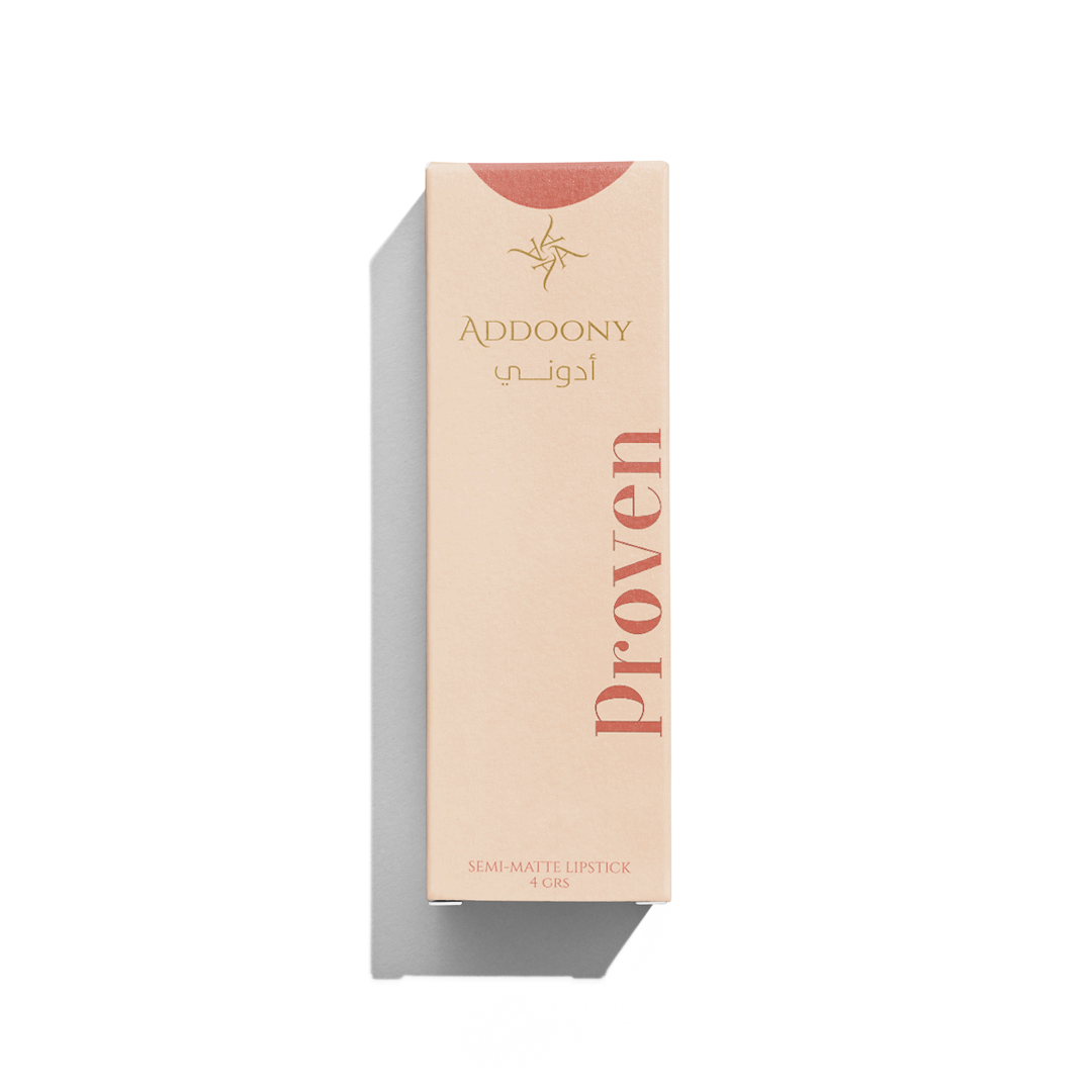 Addoony Beauty Proven Lipstick in Fitna, featuring a sleek lipstick tube with the product name and brand visible.