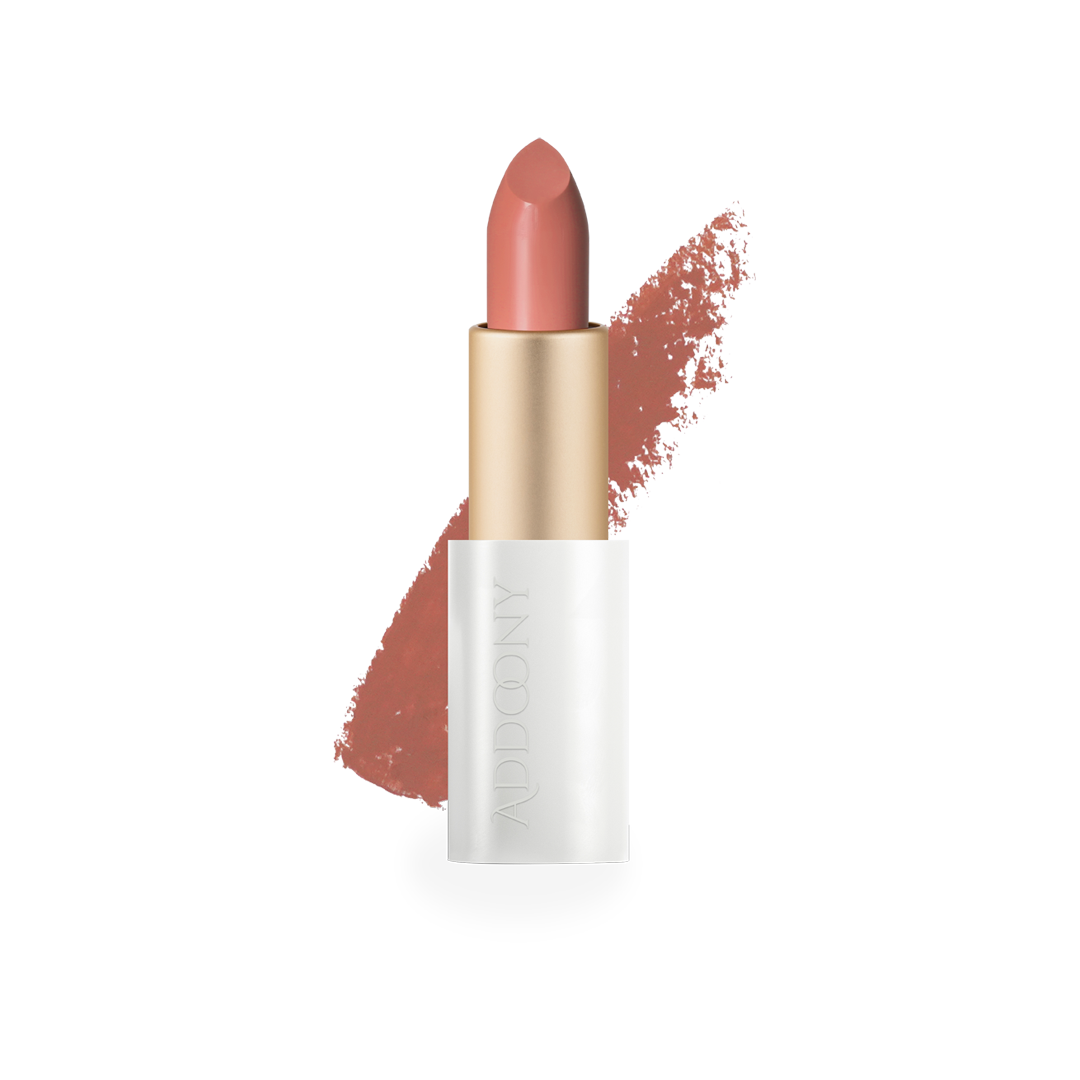 Addoony Beauty Fitna lipstick with swatch showing vibrant red color and smooth texture on a neutral background.