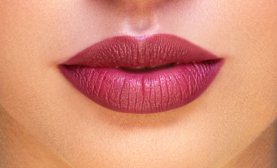 Addoony Beauty Taulah lipstick in light shade, featuring a sleek tube and the lipstick partially twisted up for application.
