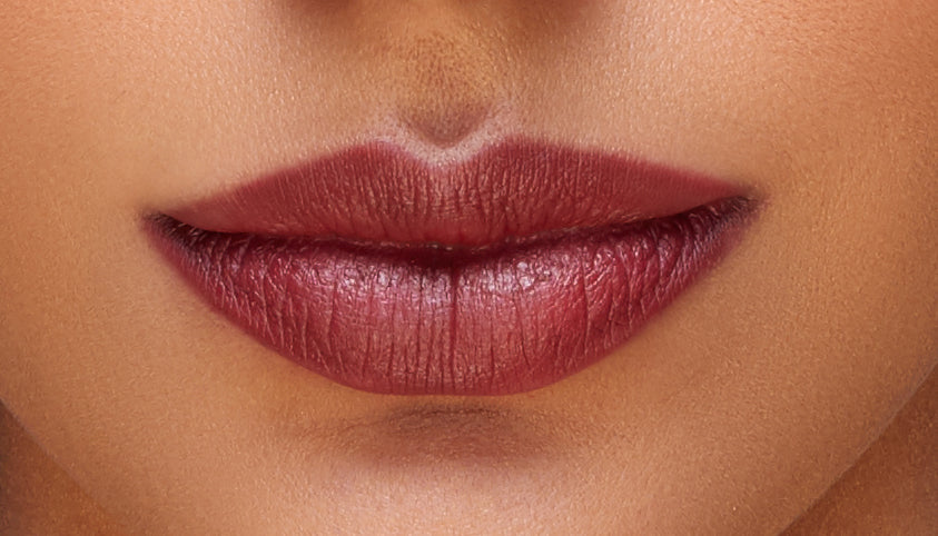 Addoony Beauty Taulah lipstick in tan shade, showcasing the smooth, creamy bullet and elegant packaging.