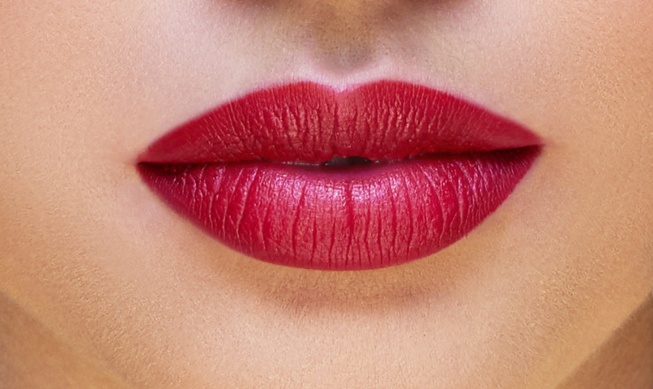 Addoony Beauty Tea Rose lipstick in a light pink shade, with the lipstick bullet displayed in a sleek tube.