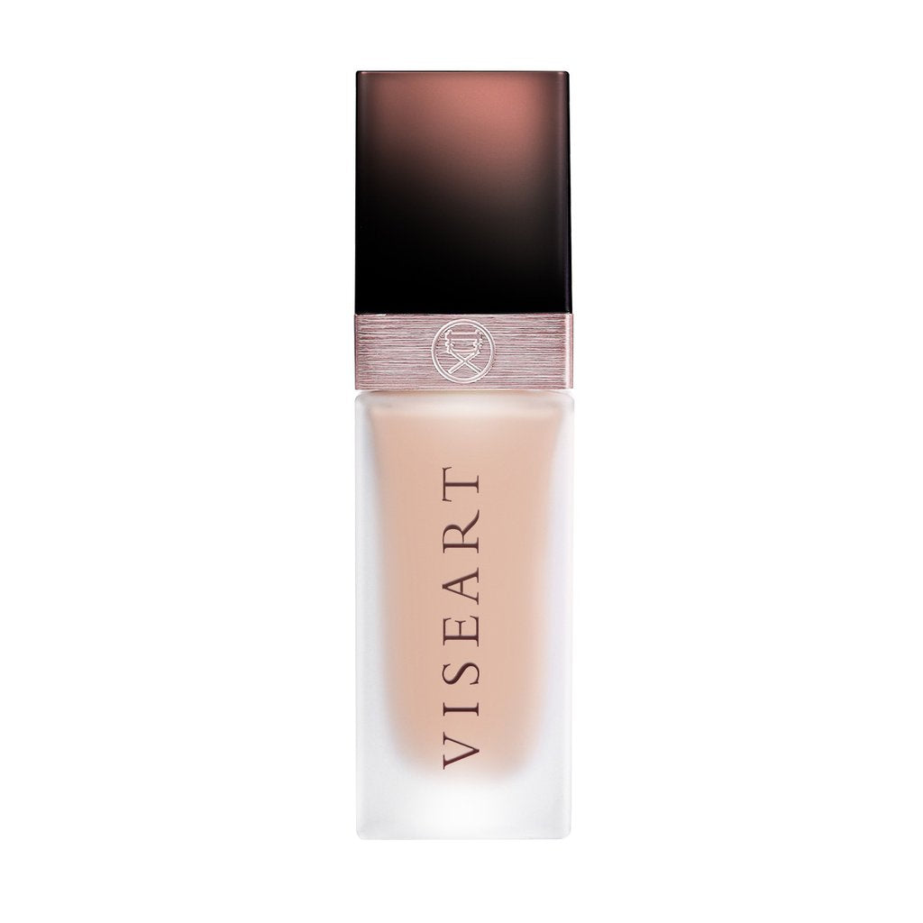 Close-up of VISEART Long Wear Flawless Foundation in Natural Beige, showcasing the sleek bottle and applicator tip.