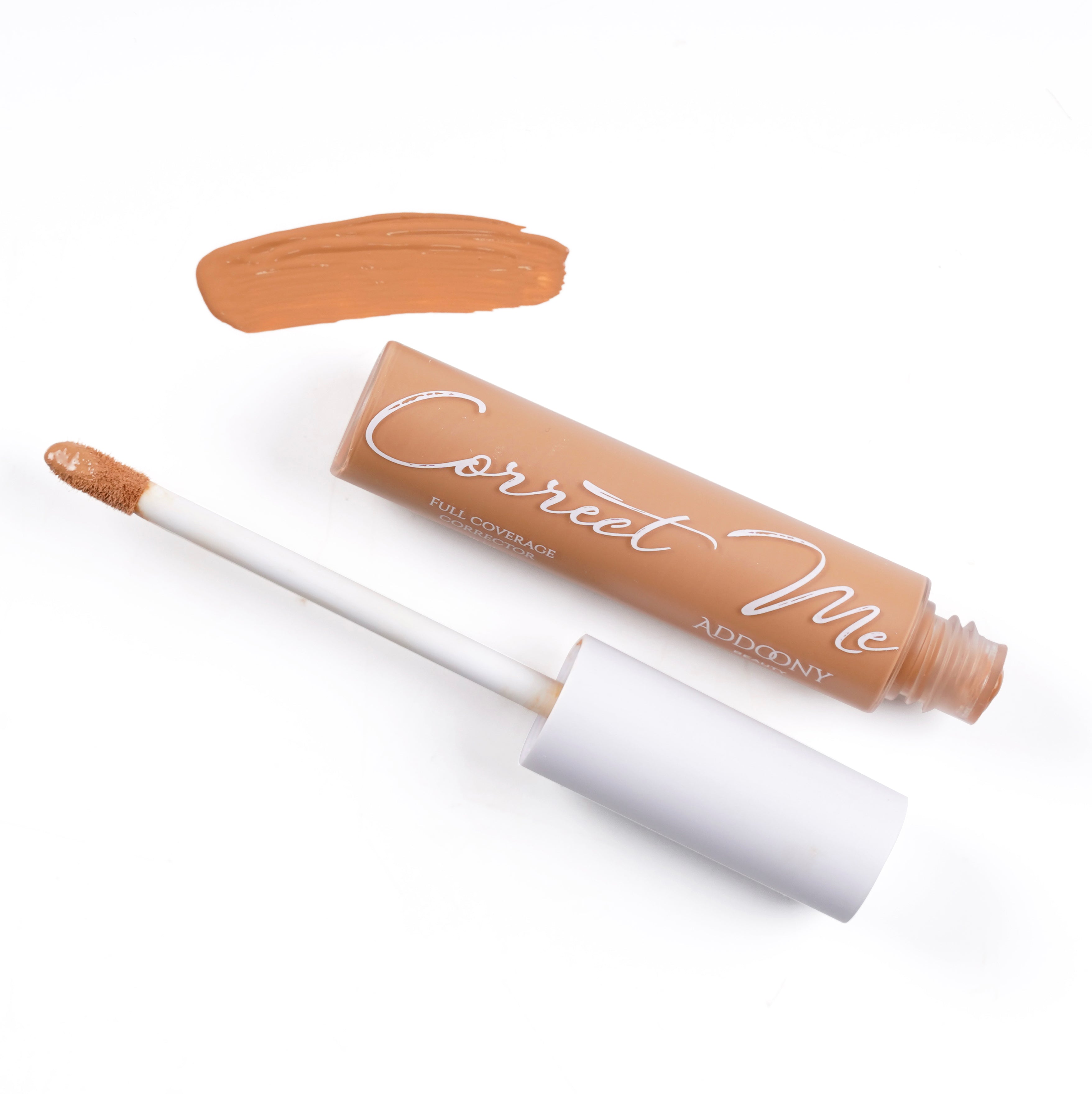 Addoony Correct Me Corrector in Saffron, a beauty corrector product from Addoony Beauty, shown in a sleek container.