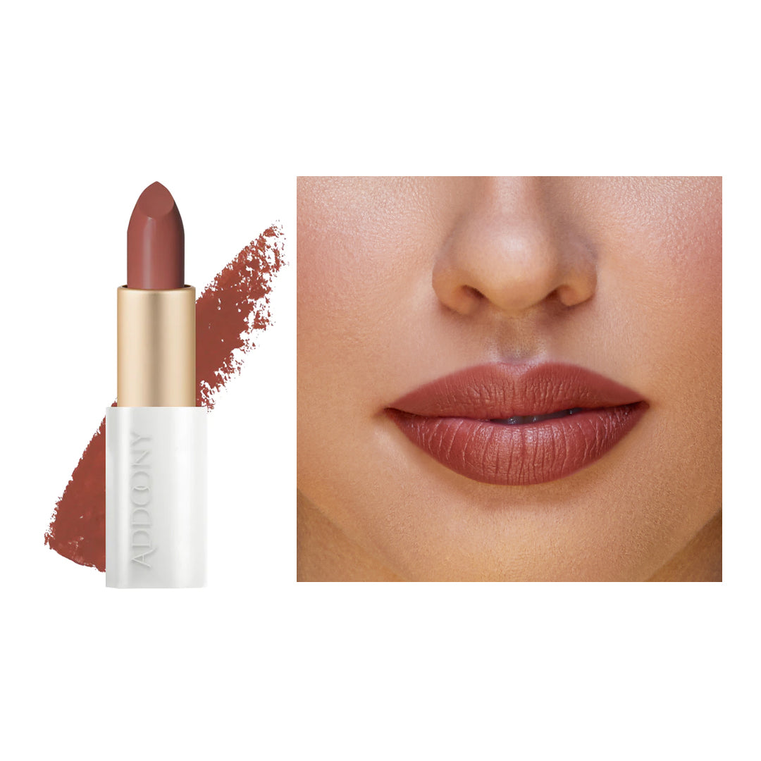Addoony Beauty Deem lipstick in a sleek tube, showcasing vibrant red shade and smooth texture for elegant lip makeup.