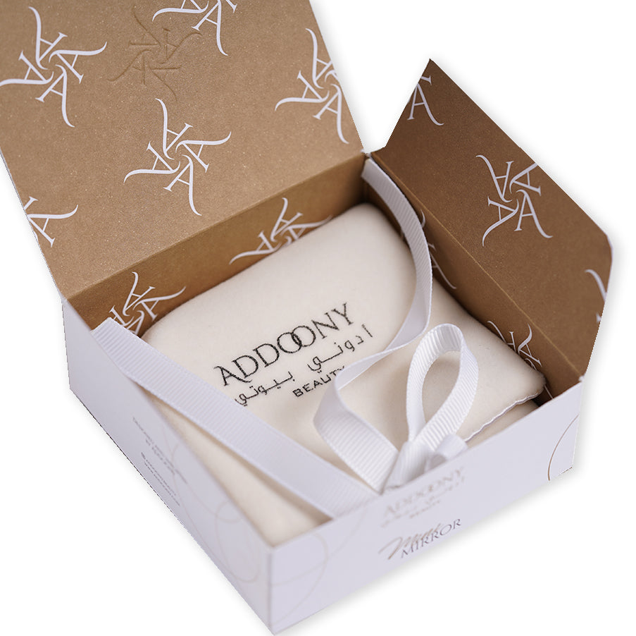 Addoony Mirror by Addoony Beauty Gifts, a compact handheld tool with a sleek reflective surface for on-the-go makeup touch-ups.